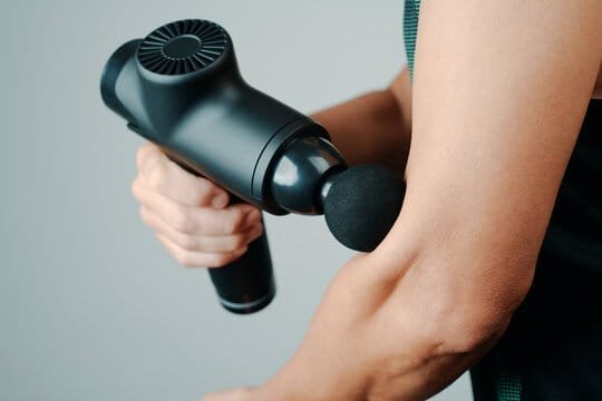 Percussion massage therapy at One Nine Sports Medicine